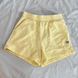 Puma Elevated Essentials Women's Pastel Yellow Shorts
